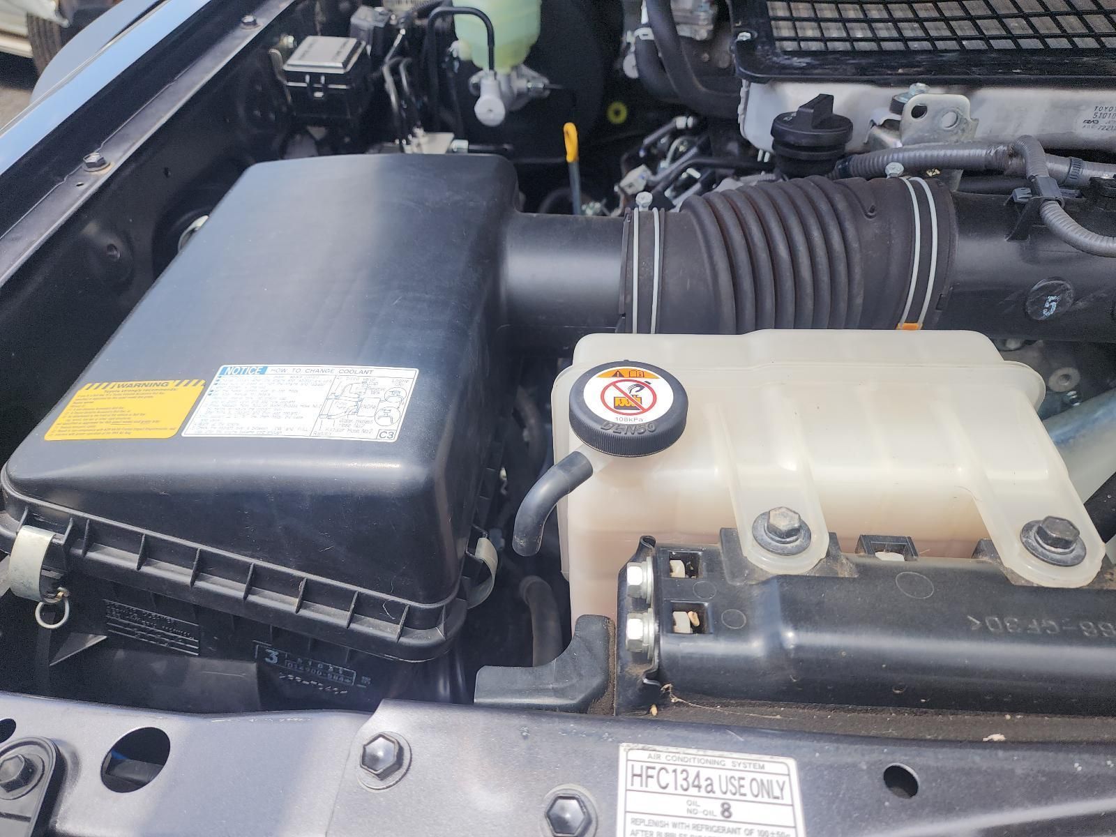Car Engine Bay With Black Air Filter Box — South West 4WD Wreckers In Harristown, QLD
