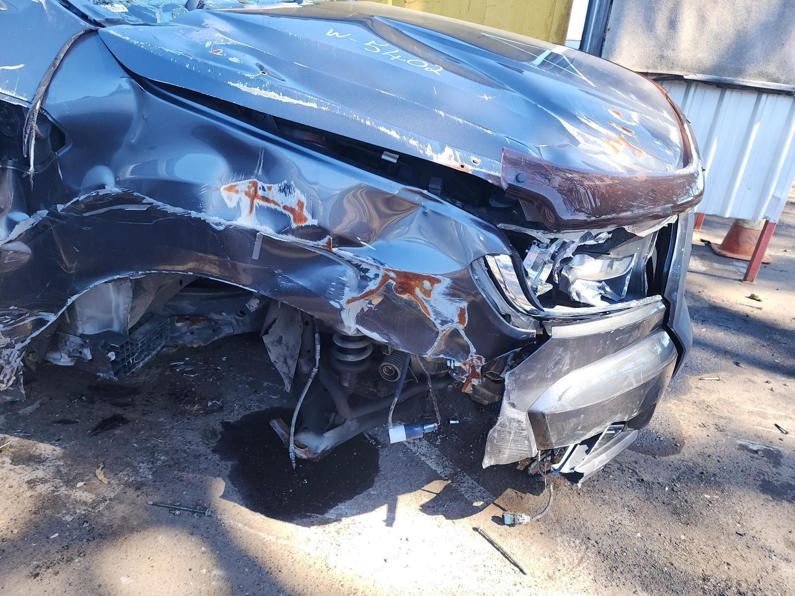 Severely Damaged Blue Car Front End — South West 4WD Wreckers In Harristown, QLD
