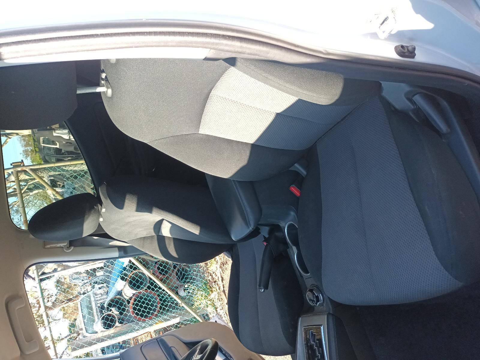Car Interior with Front Seats, Steering Wheel, and Sunshade on The Windshield — South West 4WD Wreckers In Harristown, QLD