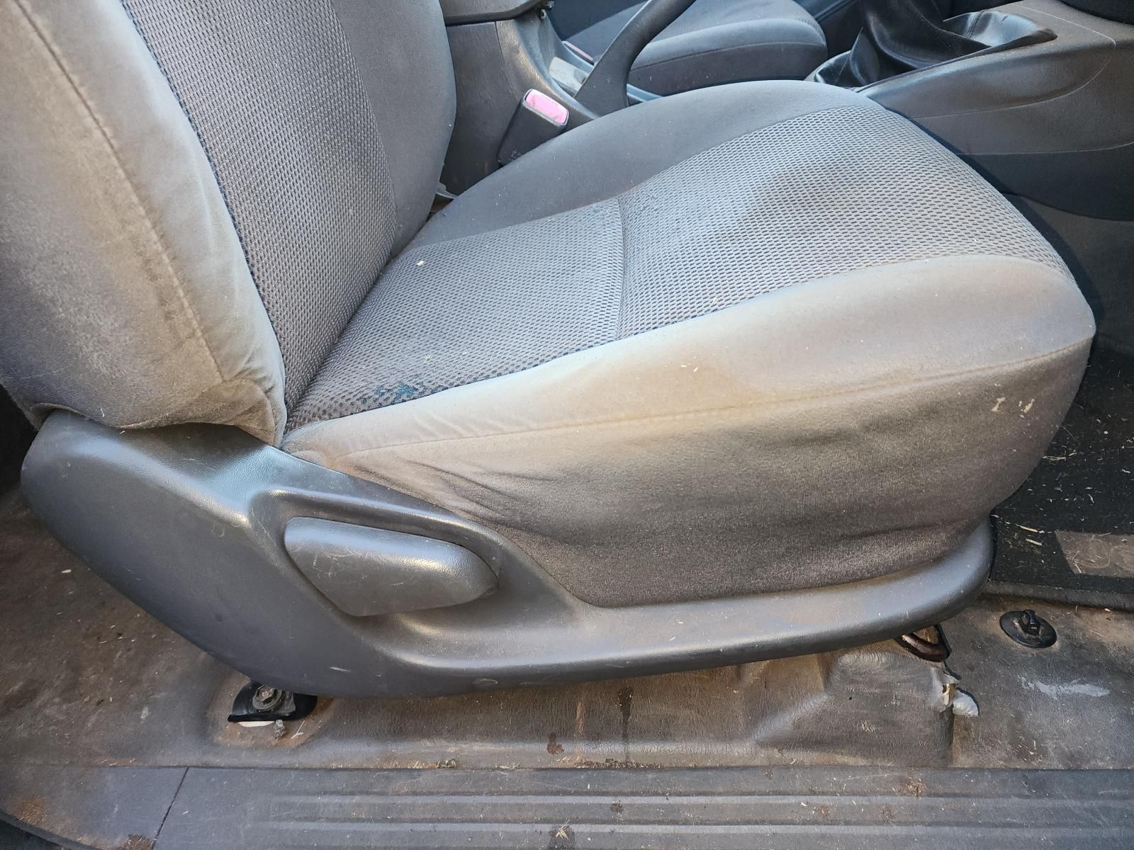 Dirty Gray Car Seat — South West 4WD Wreckers In Harristown, QLD