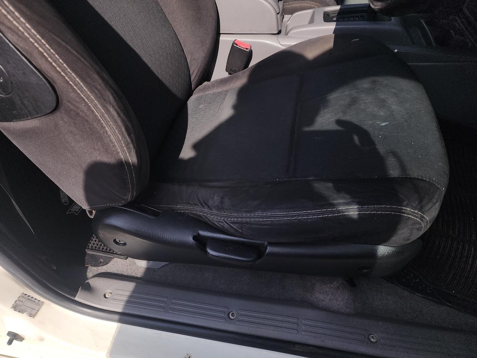 Black Car Seat Cushion With a Torn Front Edge — South West 4WD Wreckers In Harristown, QLD