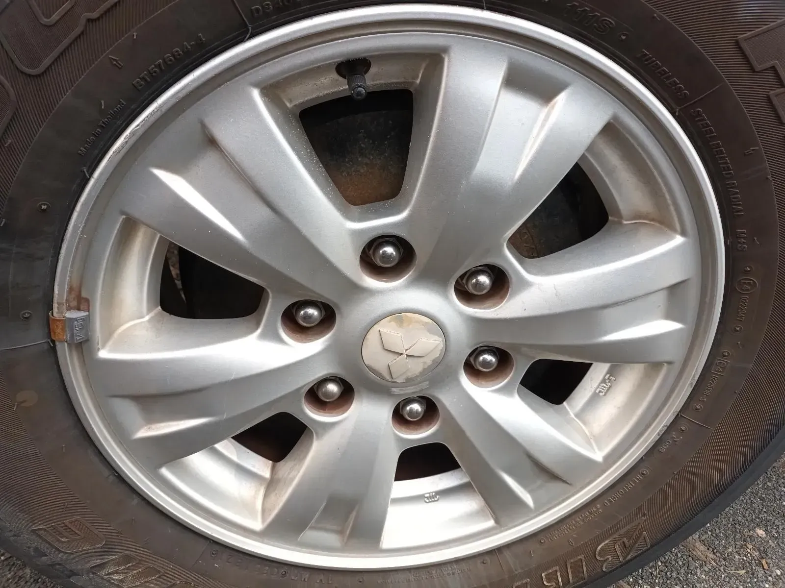 Silver Car Wheel With Tyre, Six Spokes, and Center Hub — South West 4WD Wreckers In Brisbane, QLD