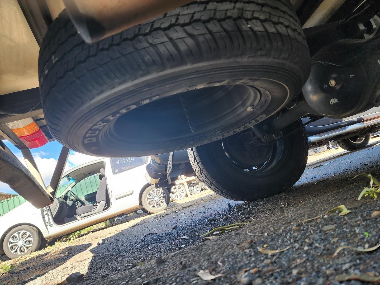 Undercarriage View of a Vehicle Parked Over Gravel — South West 4WD Wreckers In Harristown, QLD