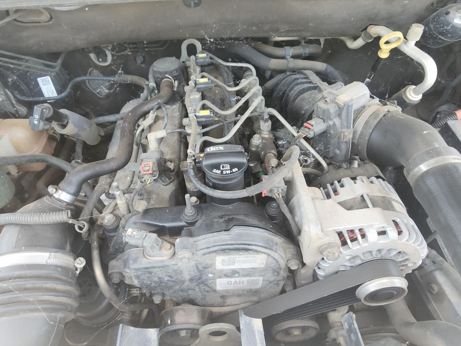 Car Engine Bay With Exposed Components — South West 4WD Wreckers In Harristown, QLD