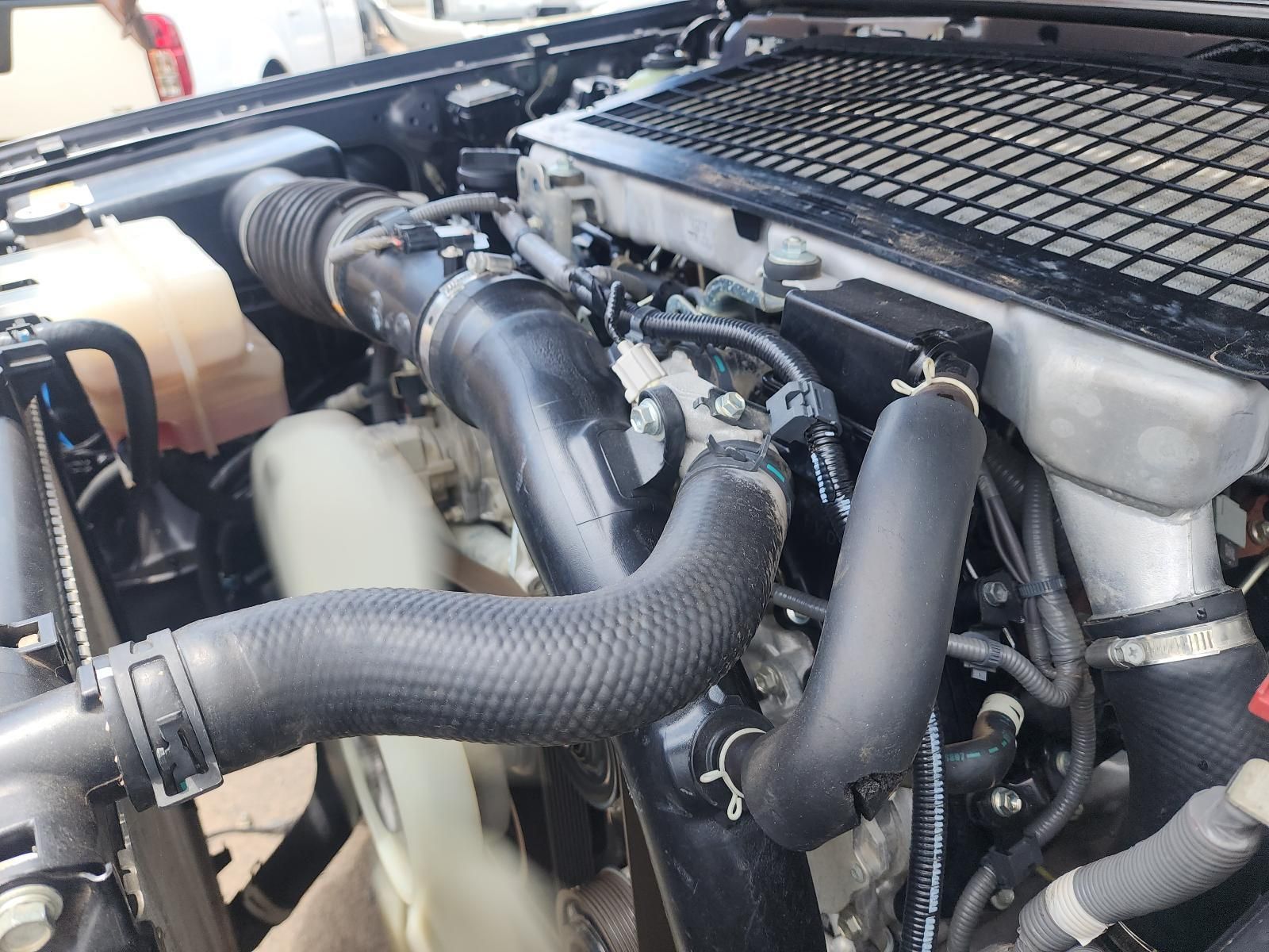 Open Car Engine Bay With Black Hoses — South West 4WD Wreckers In Harristown, QLD