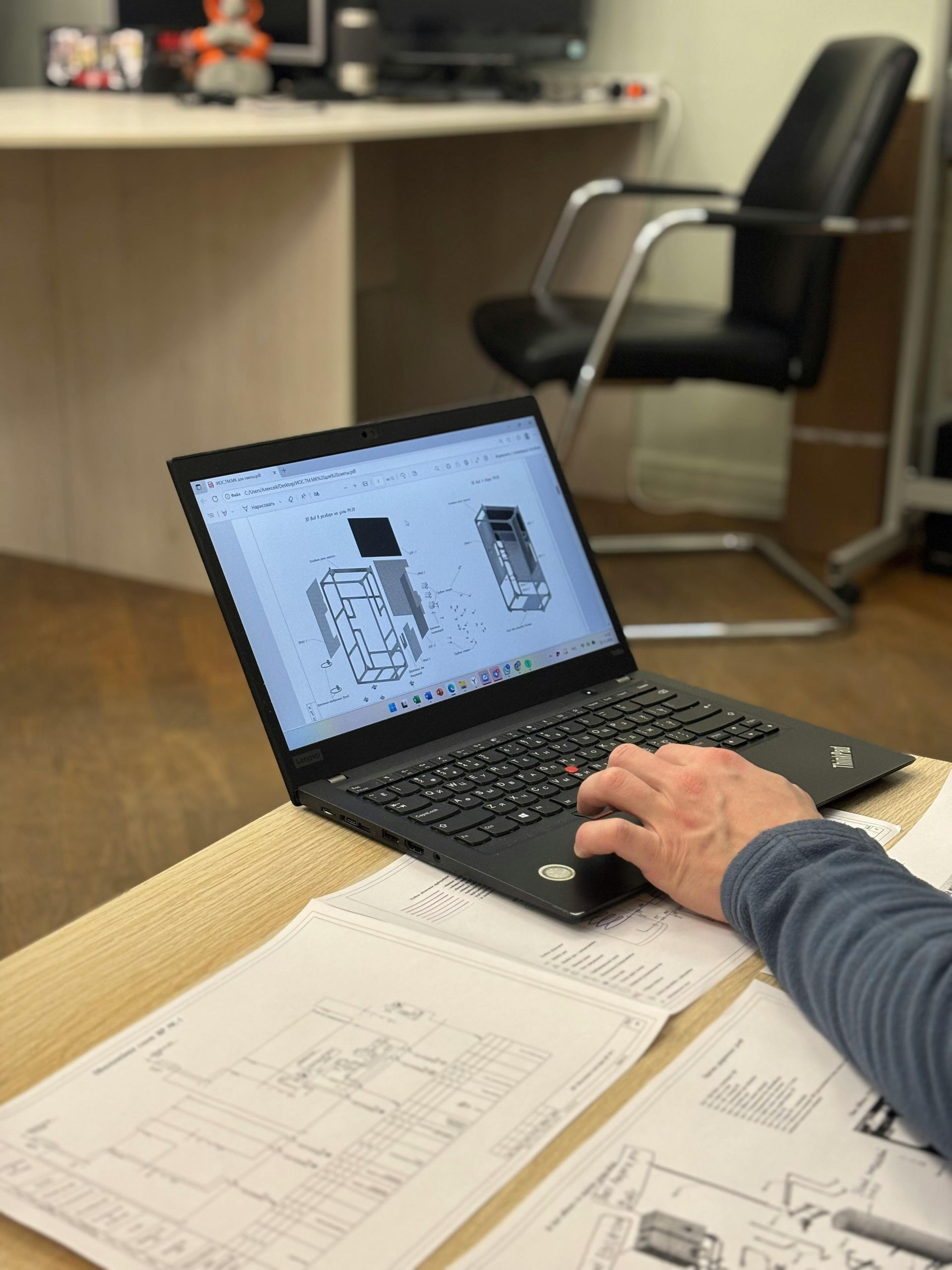Person Using A Laptop, Reviewing Diagrams — GS Design & Drafting In Lismore, NSW