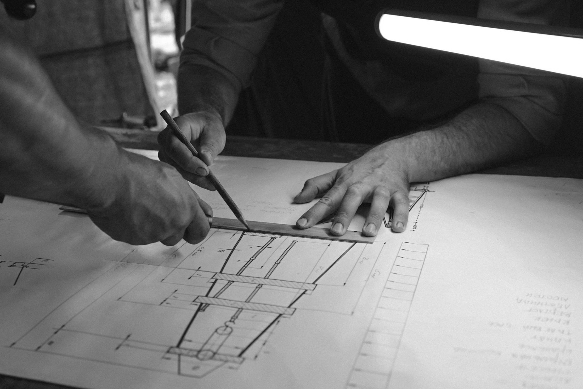 Architectural Blueprints, With Rolled-up Plans On The Right Side — GS Design & Drafting In Rous, NSW