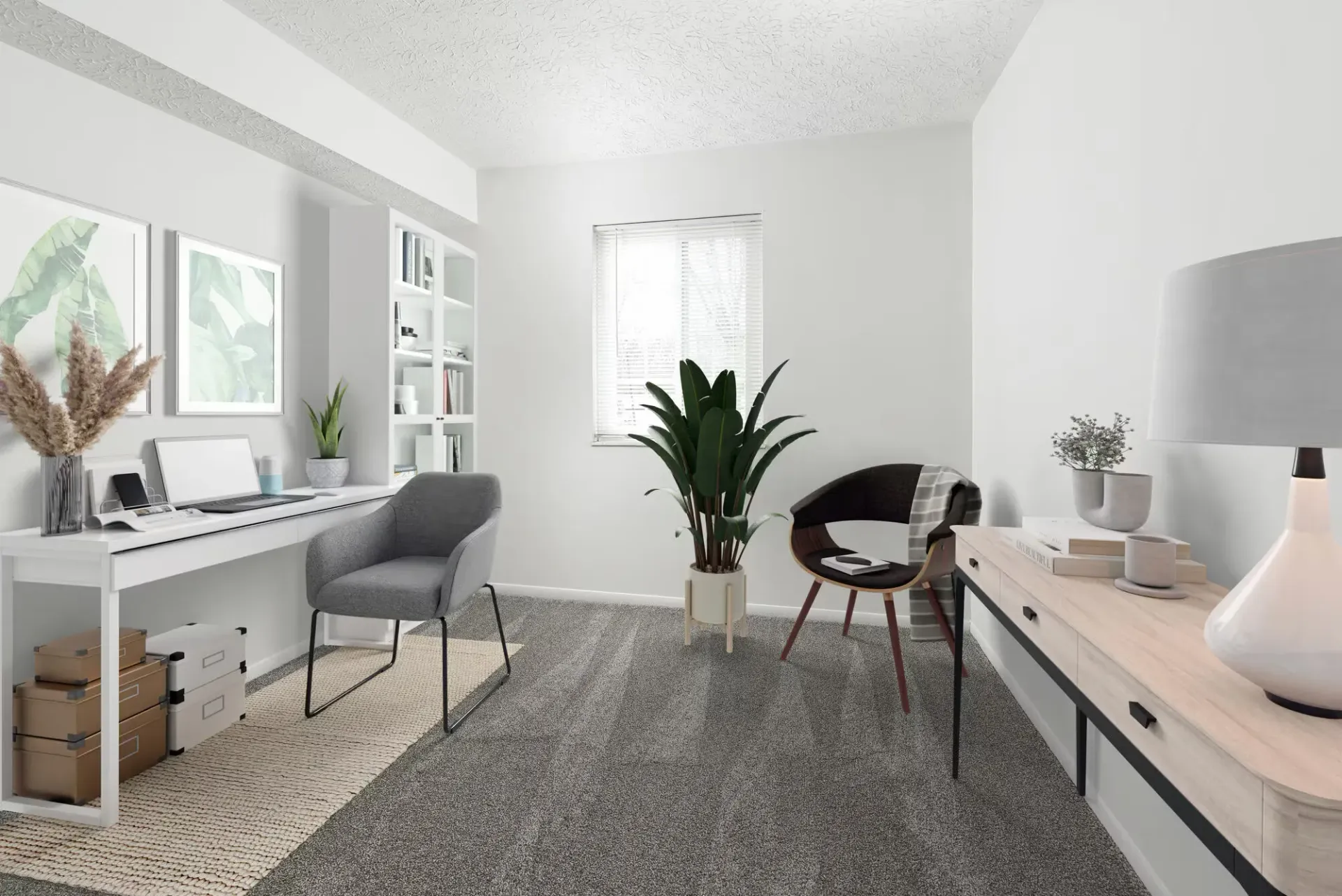 Bright minimalist apartment office with white desk, gray chair, built-in shelves, and plants