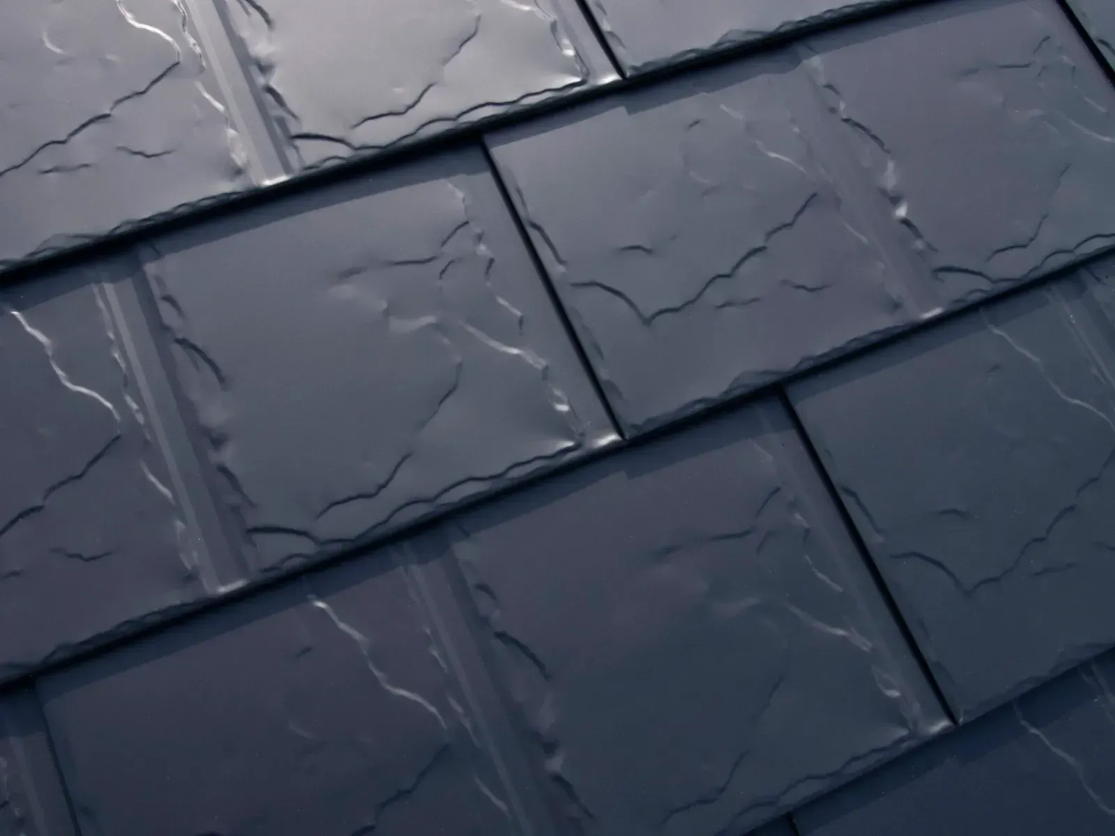 Slate-style aluminum metal roofing installed in Beaverton, Oregon designed for long-term protection against rain and moss.