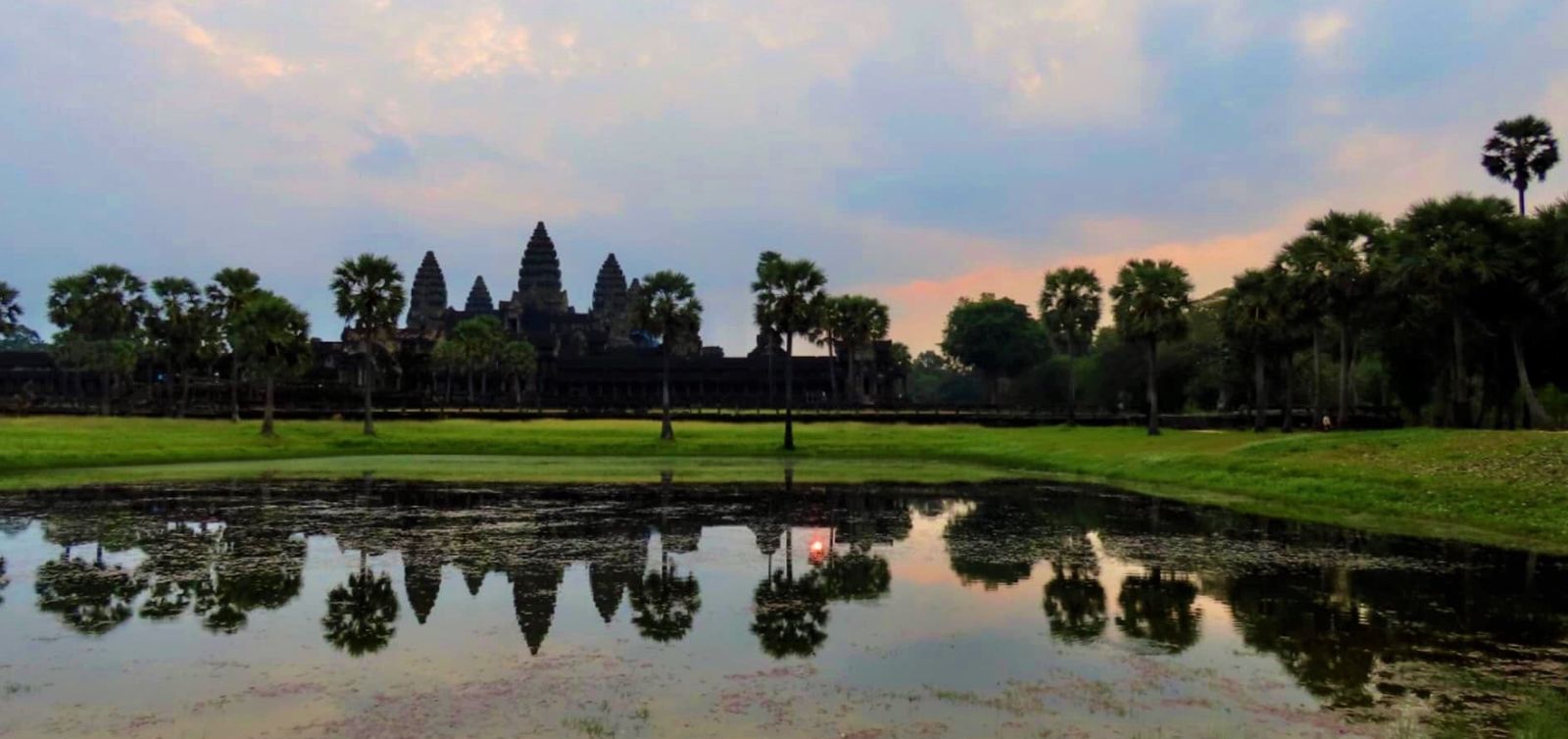 Angkor Wat sunrise tour with a private guide, exploring Bayon, Ta Prohm, and other famous temples in Siem Reap.