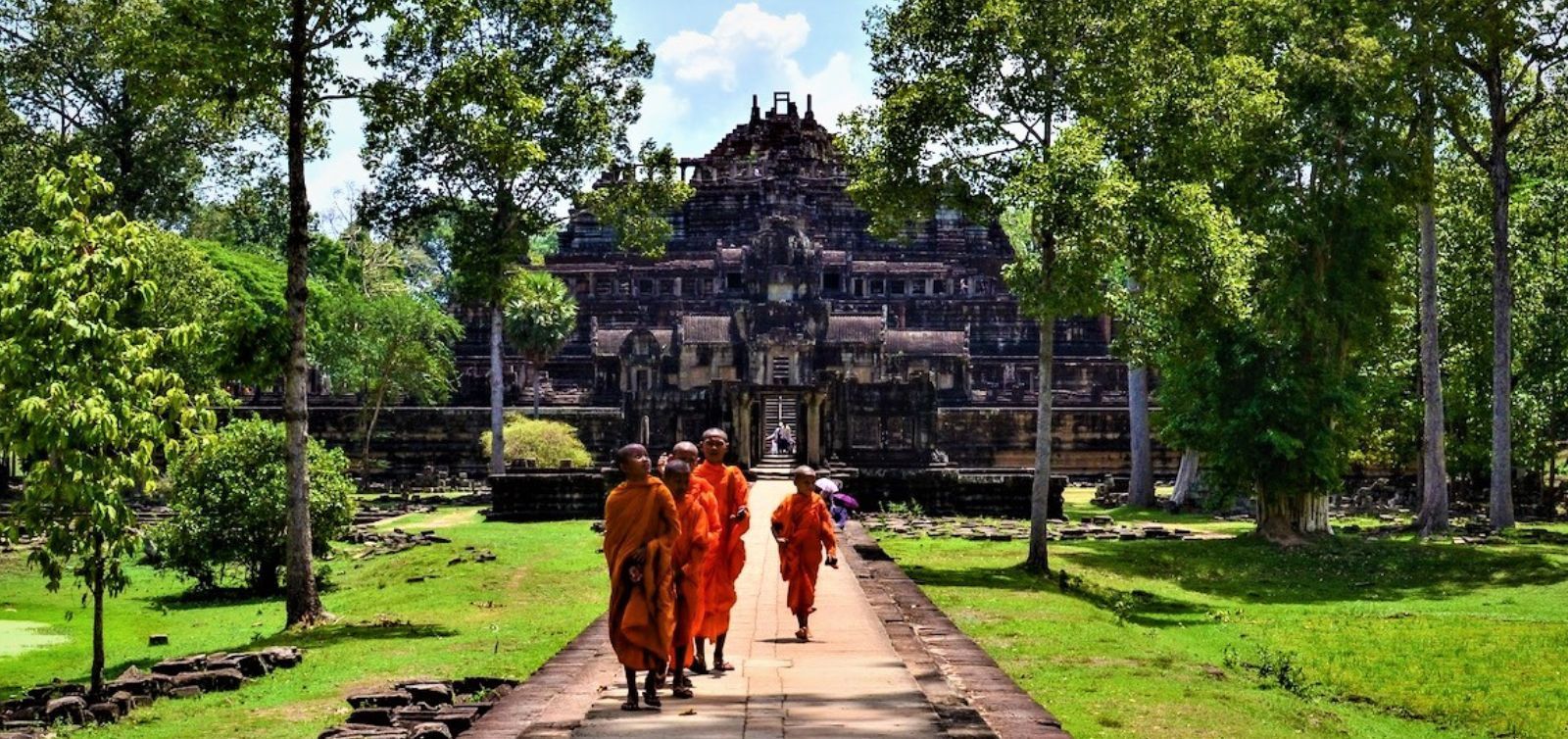 Angkor Wat sunrise tour with a private guide, exploring Bayon, Ta Prohm, and other famous temples in Siem Reap.