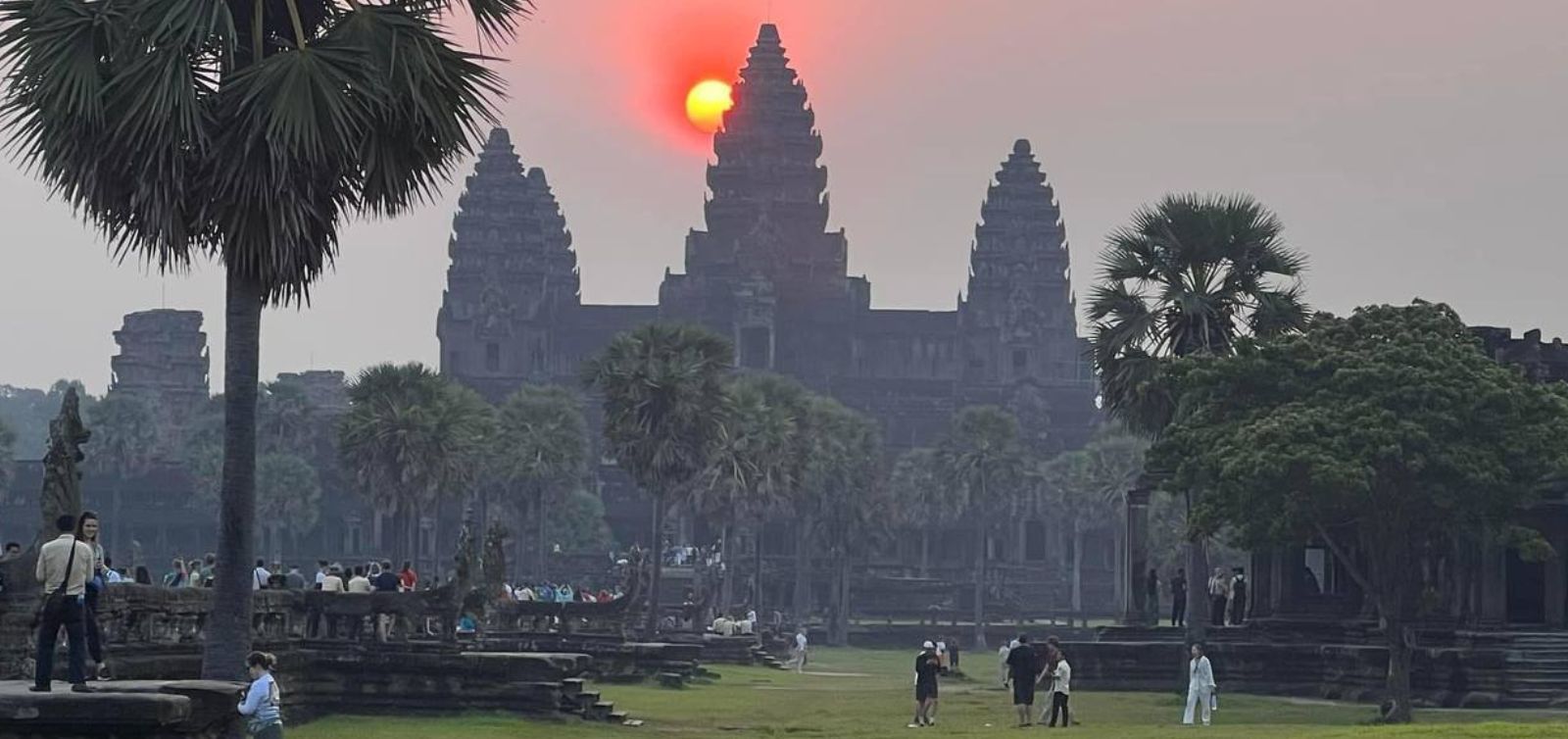 Angkor Wat sunrise tour with a private guide, exploring Bayon, Ta Prohm, and other famous temples in Siem Reap.