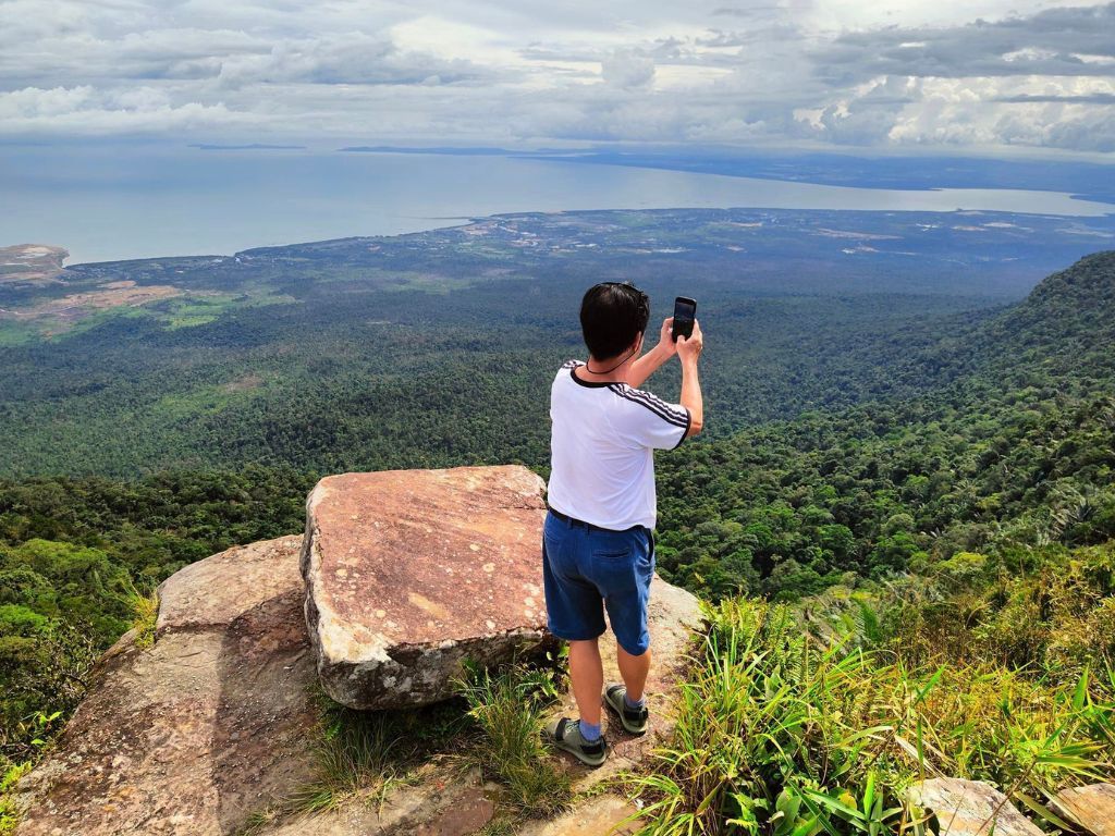 Private Bokor National Park day tour from Phnom Penh, featuring misty mountains, waterfalls, and historic French colonial buildings