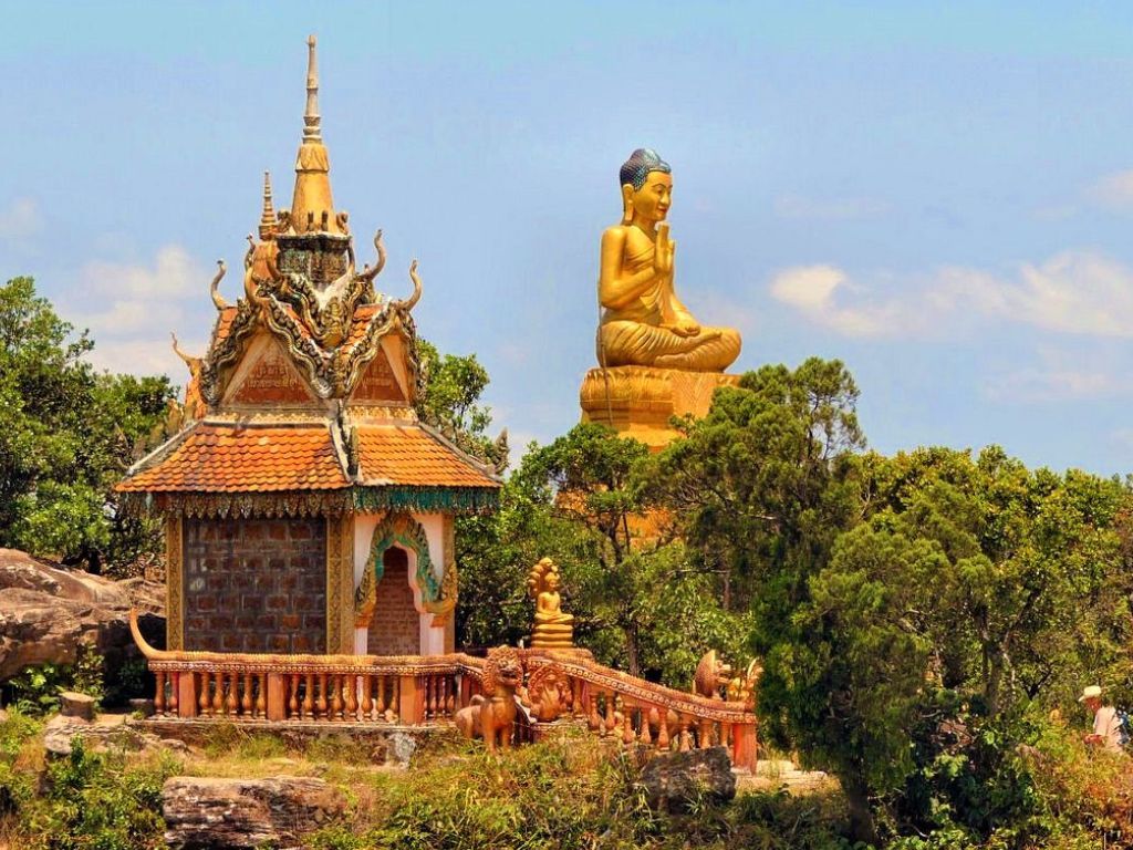 Private Bokor National Park day tour from Phnom Penh, featuring misty mountains, waterfalls, and historic French colonial buildings