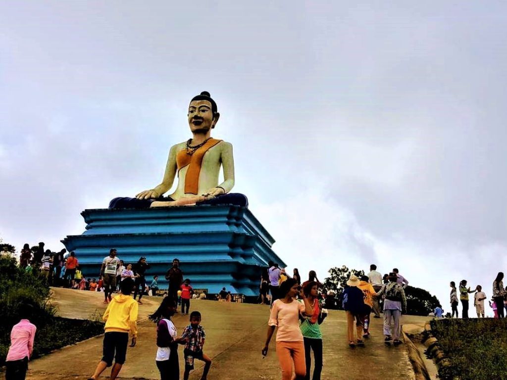 Private Bokor National Park day tour from Phnom Penh, featuring misty mountains, waterfalls, and historic French colonial buildings