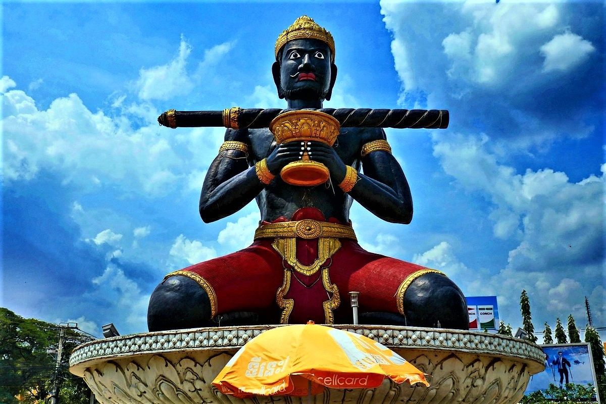 Traveler on a private 14-day Cambodia guided tour exploring Angkor Wat, Phnom Penh, Battambang, and coastal landscapes with a local guide.