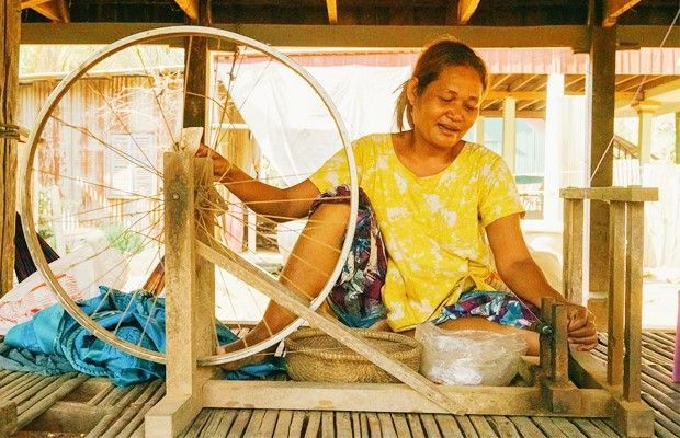 Phnom Penh private day tour to Koh Dach Silk Island, exploring traditional silk weaving, local villages, and city highlights by the Mekong River.