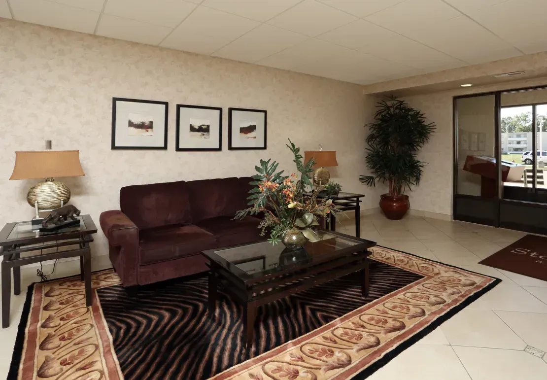 A living room with a couch and a coffee table