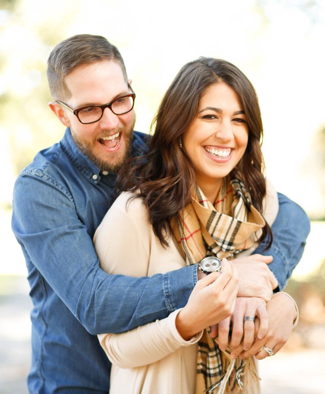 Get dental implants at our family dentist in Metairie LA 70002 Couple smiling and holding each other | Dental implant services in Metairie LA 70002