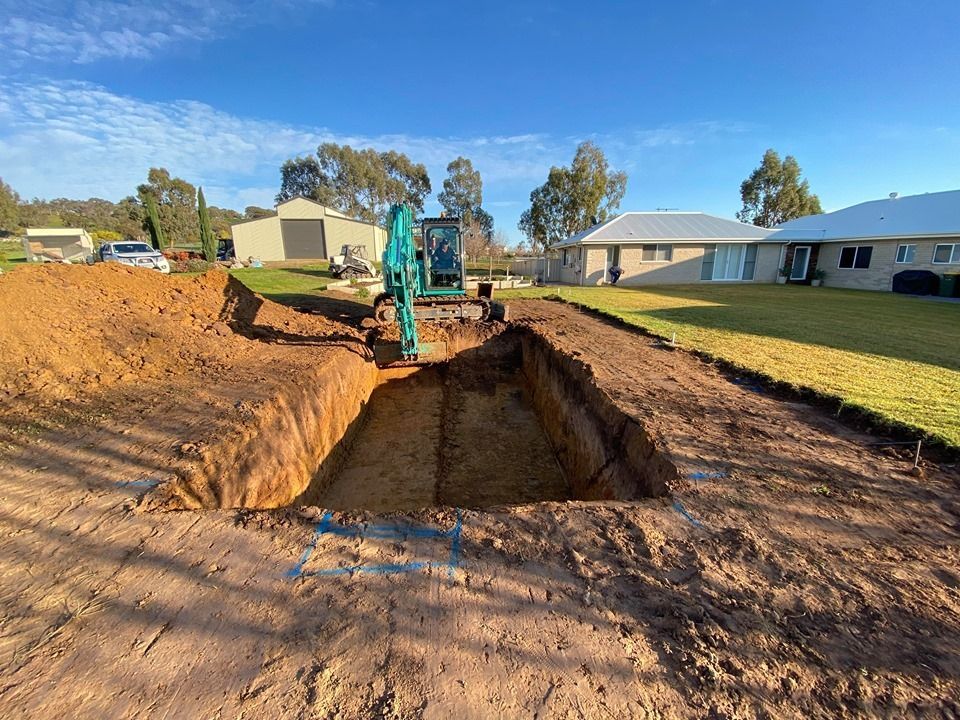 Pool Excavate And Construction And Industry Steel Ground Soil Dirt Structure — Spa & Pool Installation in Wagga Wagga, NSW