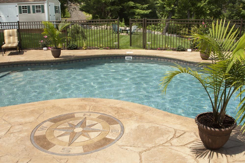 Front Luxury Salt Water Pool And Patio In A Residential Backyard — Professional Pool Builder in Tumut, NSW