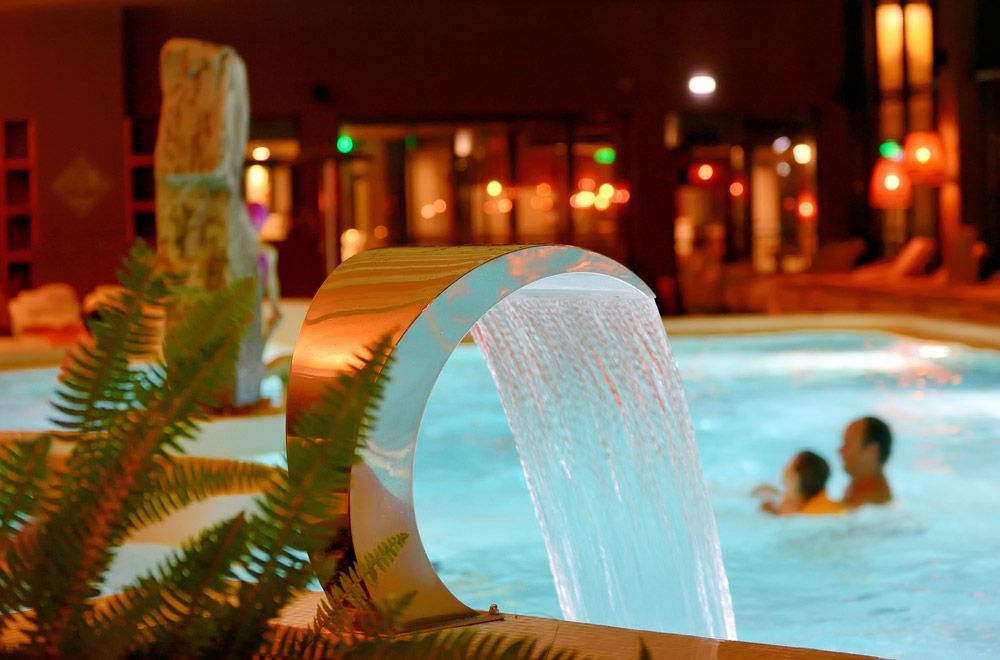 Relaxation Pool In Spa With Waterfall — Custom Spas in Wagga Wagga, NSW