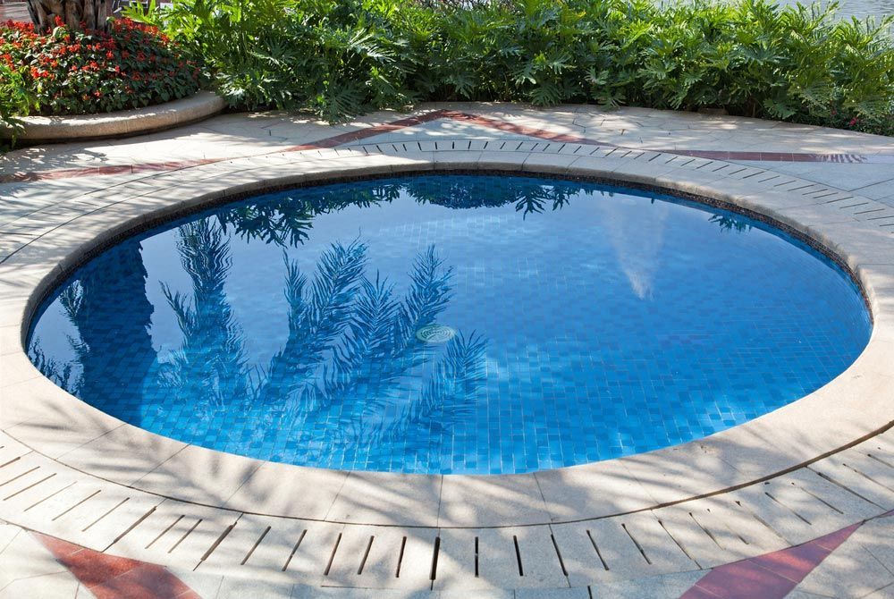 Small Swimming Pool In A Yard And Spa Pool — Custom Spas in Wagga Wagga, NSW