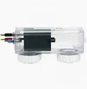 Clear plastic chlorinator with a black module, blue, red, and yellow wires, and white threaded caps.