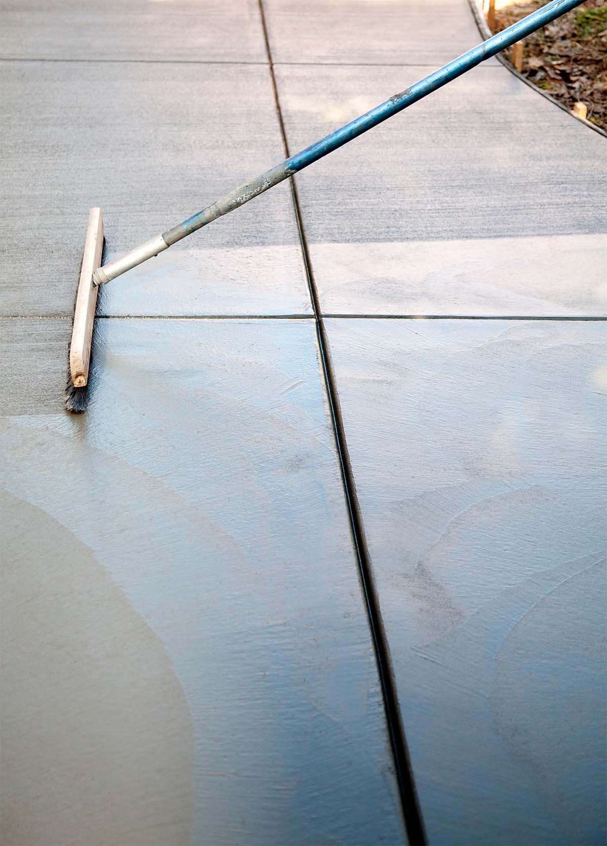 Toowoomba Concreter Brooming A Concrete Surface