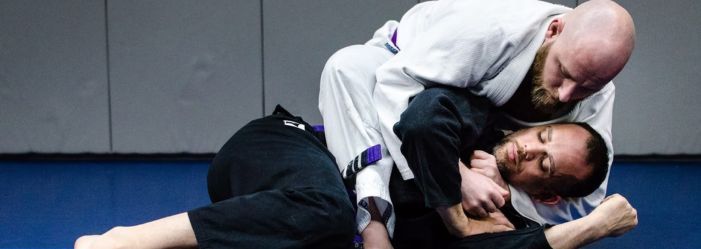 two men over 30 training jiu-jitsu