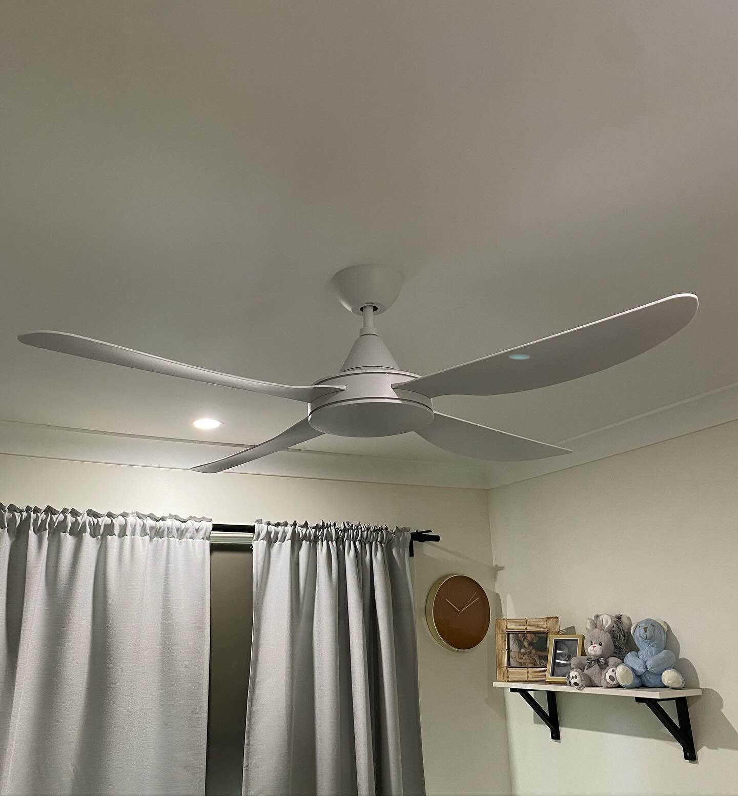 White ceiling fan installed in a residential room