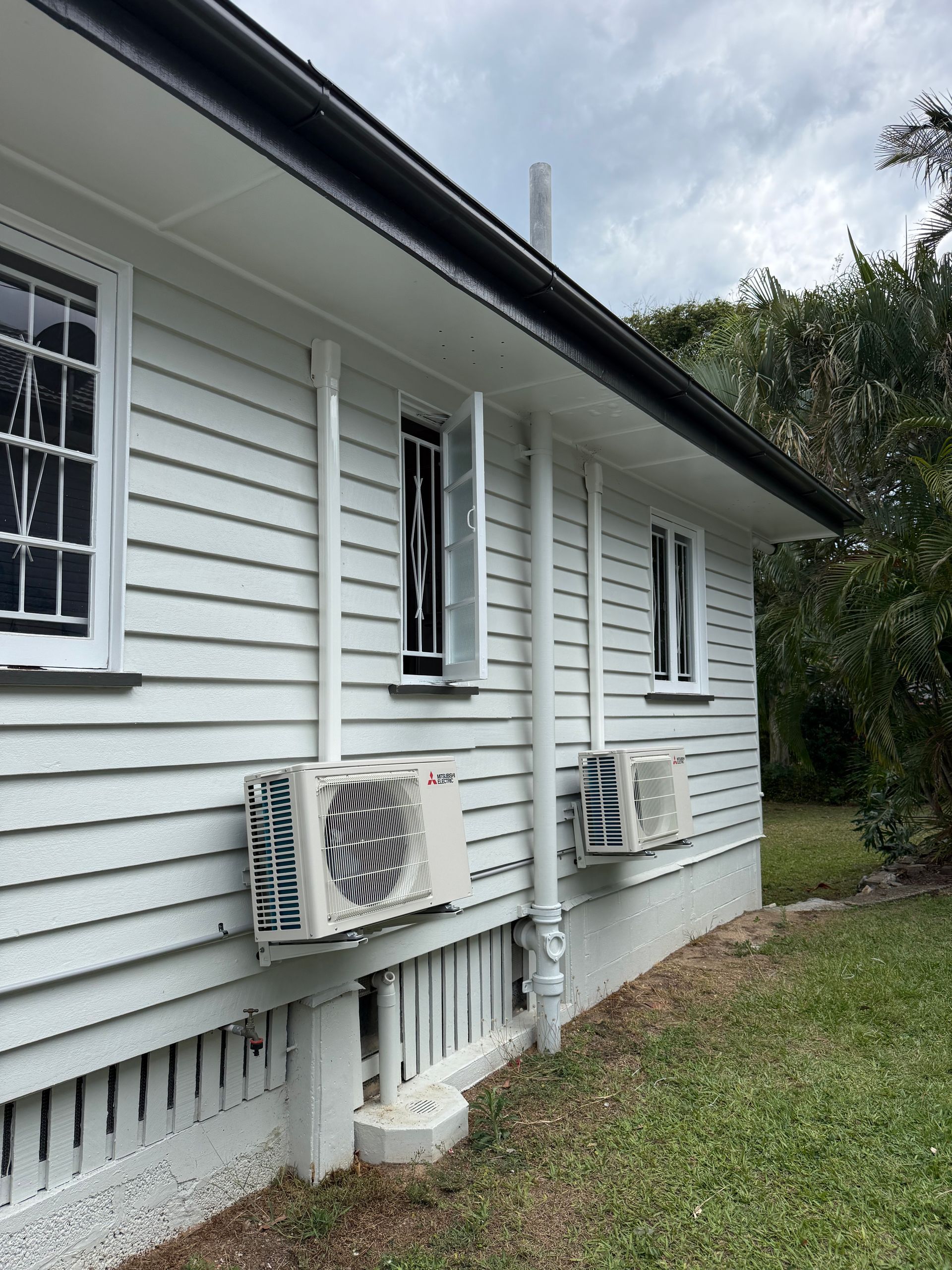 Outdoor air conditioning units installed on a residential home