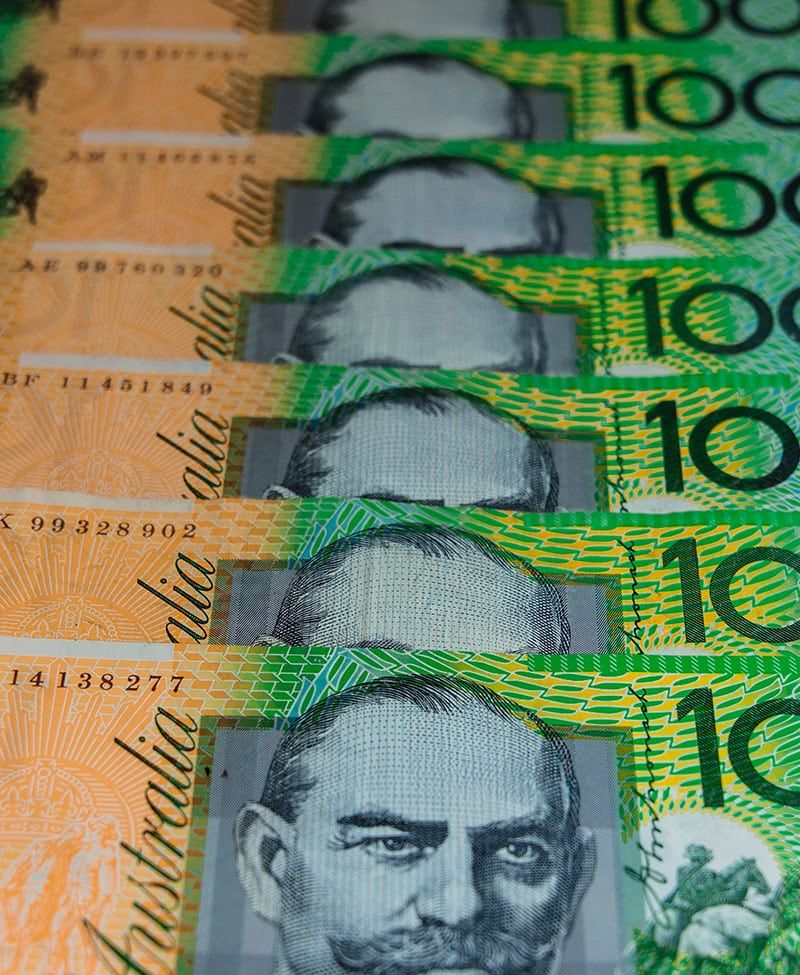 A Row of Australian Dollars Are Lined up In a Row — Sunshine Coast Financial Advisers in Maroochydore, QLD