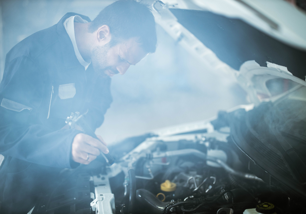 repairing a car engine that's overheating by garage in Spencers Wood