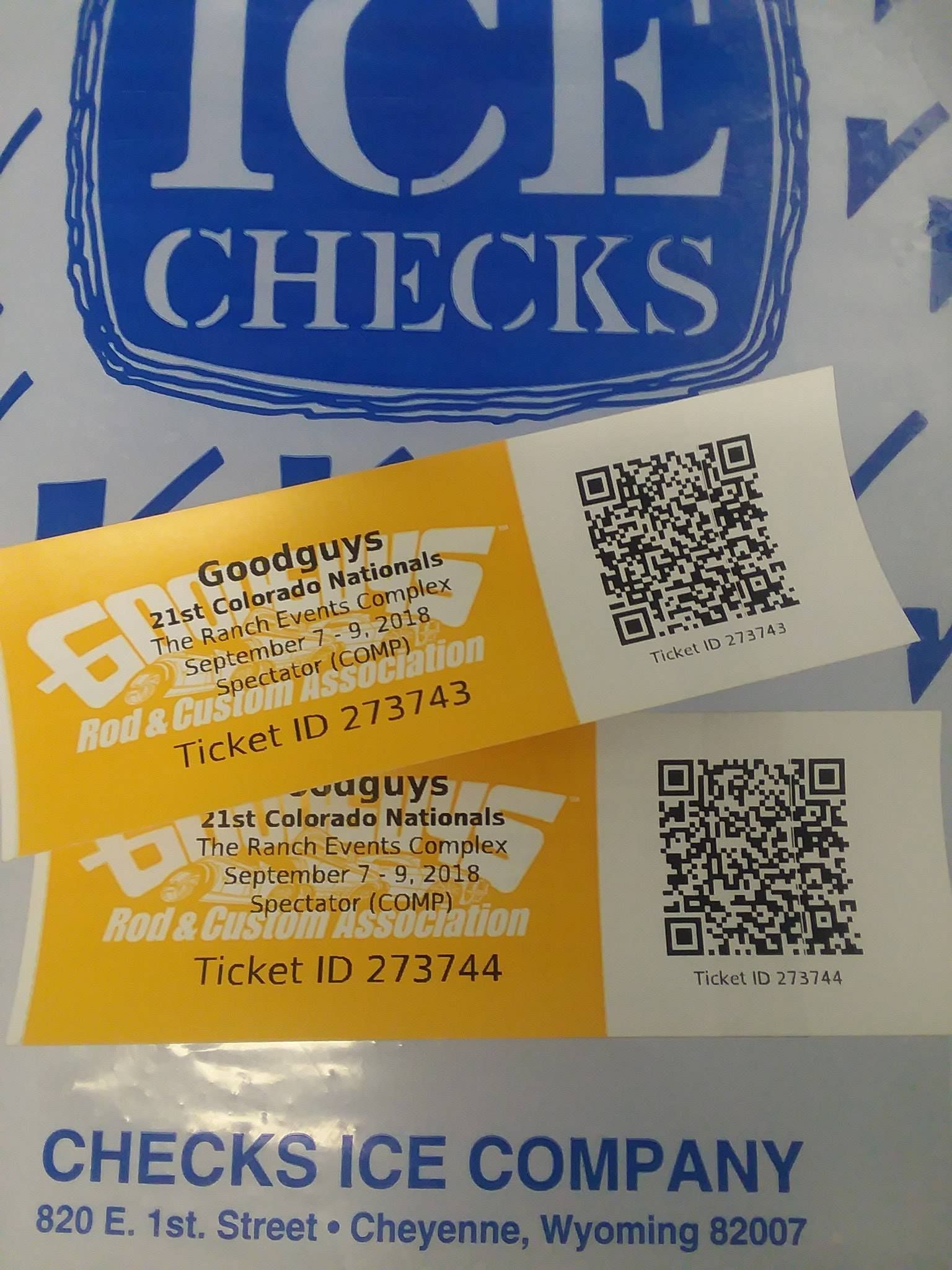 Two yellow Goodguys Rod & Custom Association event tickets with QR codes, on a blue and white 