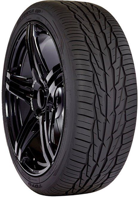 A Toyo brand tire mounted on a glossy black five-spoke alloy wheel against a white background.