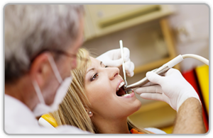 Dentist Putting Dental Filling