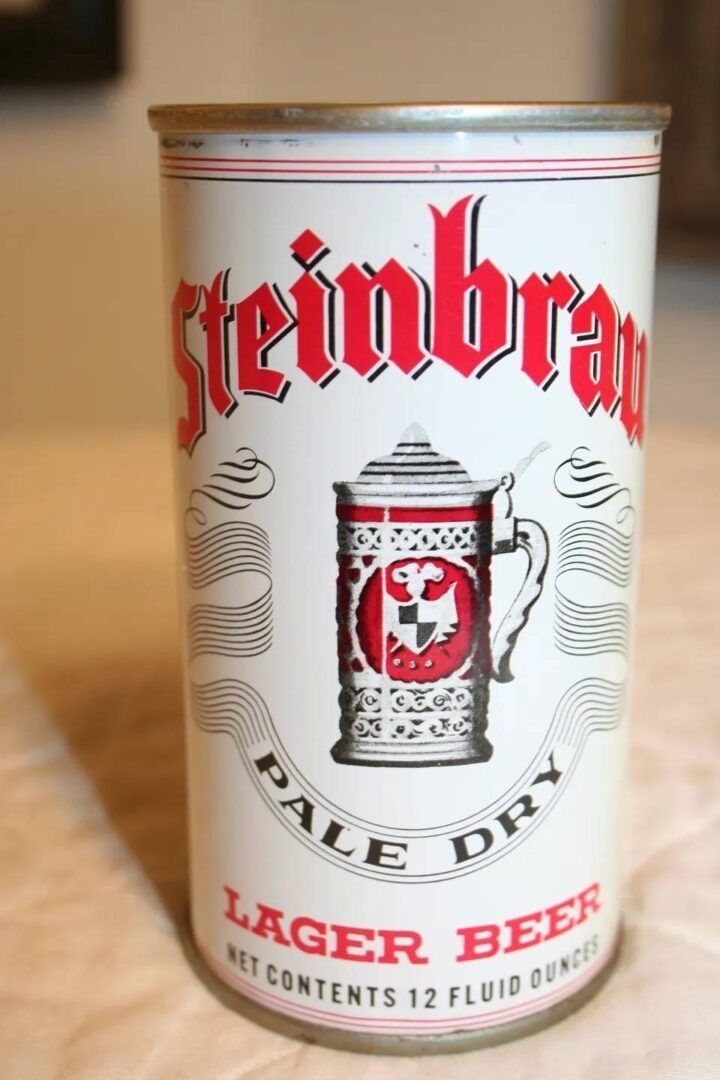 Steinbrau pale dry lager beer can, white with red and black label, shown upright on a surface
