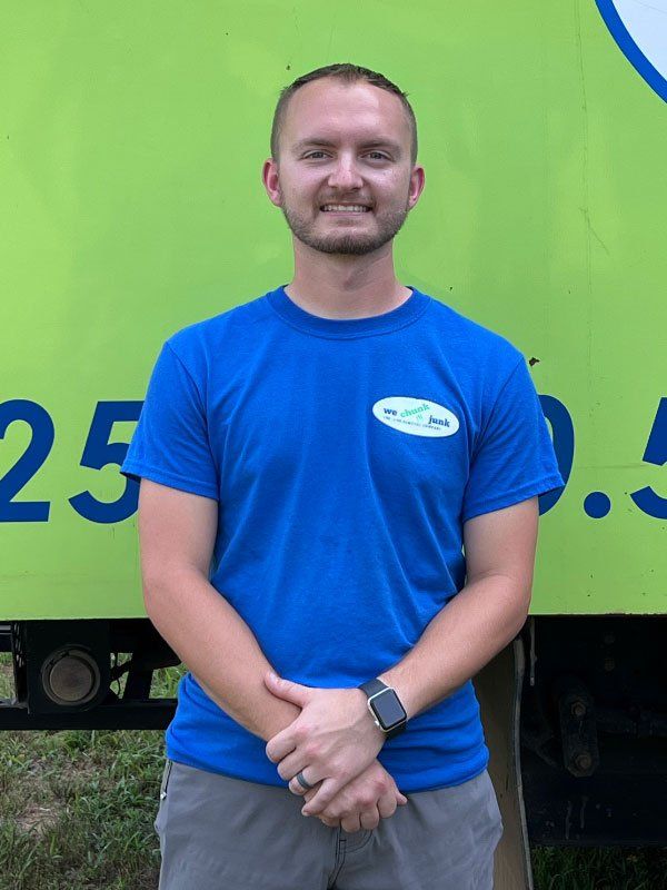 A man wearing a blue shirt with the number 25 on it