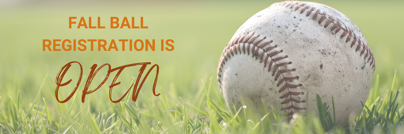 Dirty baseball sitting on grass with the words Fall Ball Registration is Open.