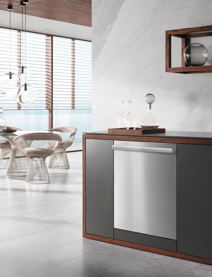 Stainless steel dishwasher built into a modern kitchen cabinet.