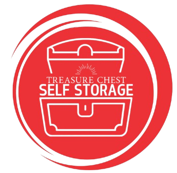 A red circular logo featuring a white line drawing of an open treasure chest with the text "TREASURE CHEST SELF STORAGE".