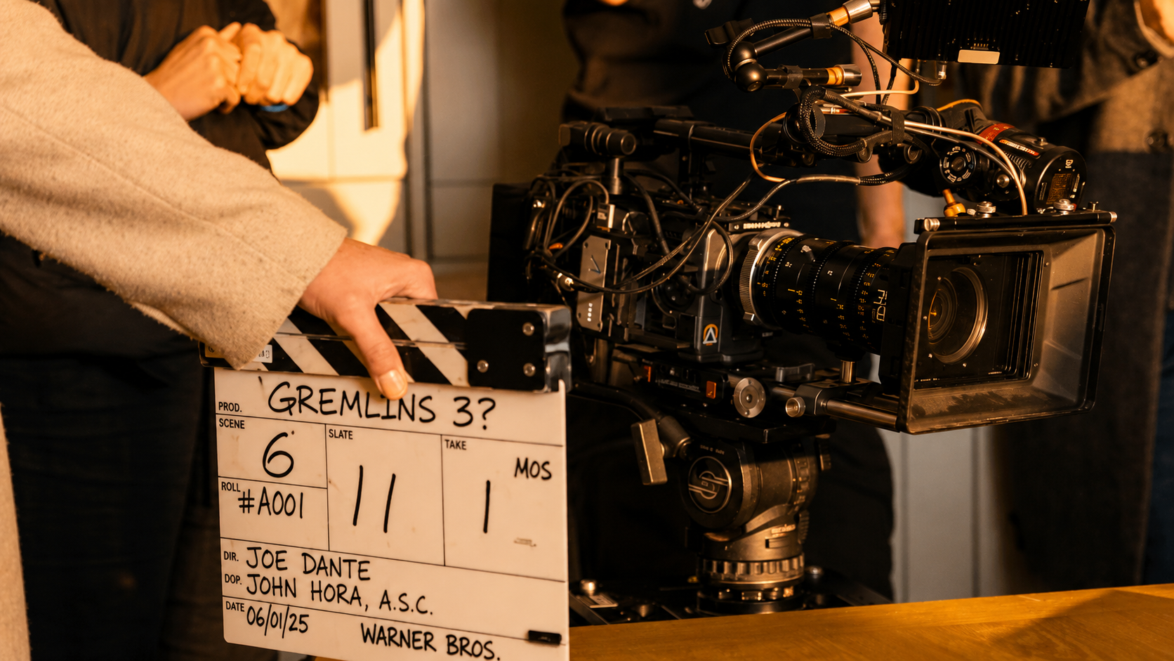 Film camera and clapperboard representing the production of Gremlins 3 as the franchise returns after 37 years.