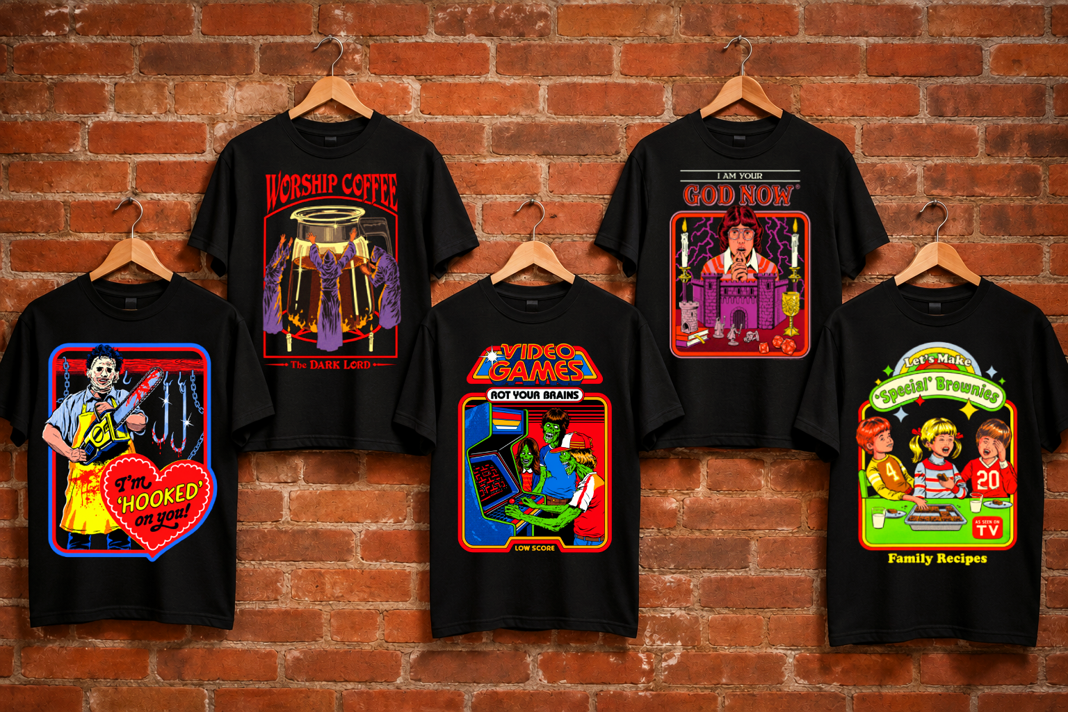 Five black Steven Rhodes graphic T-shirts displayed on hangers against a red brick wall for Ninth Planet's Alternative range.