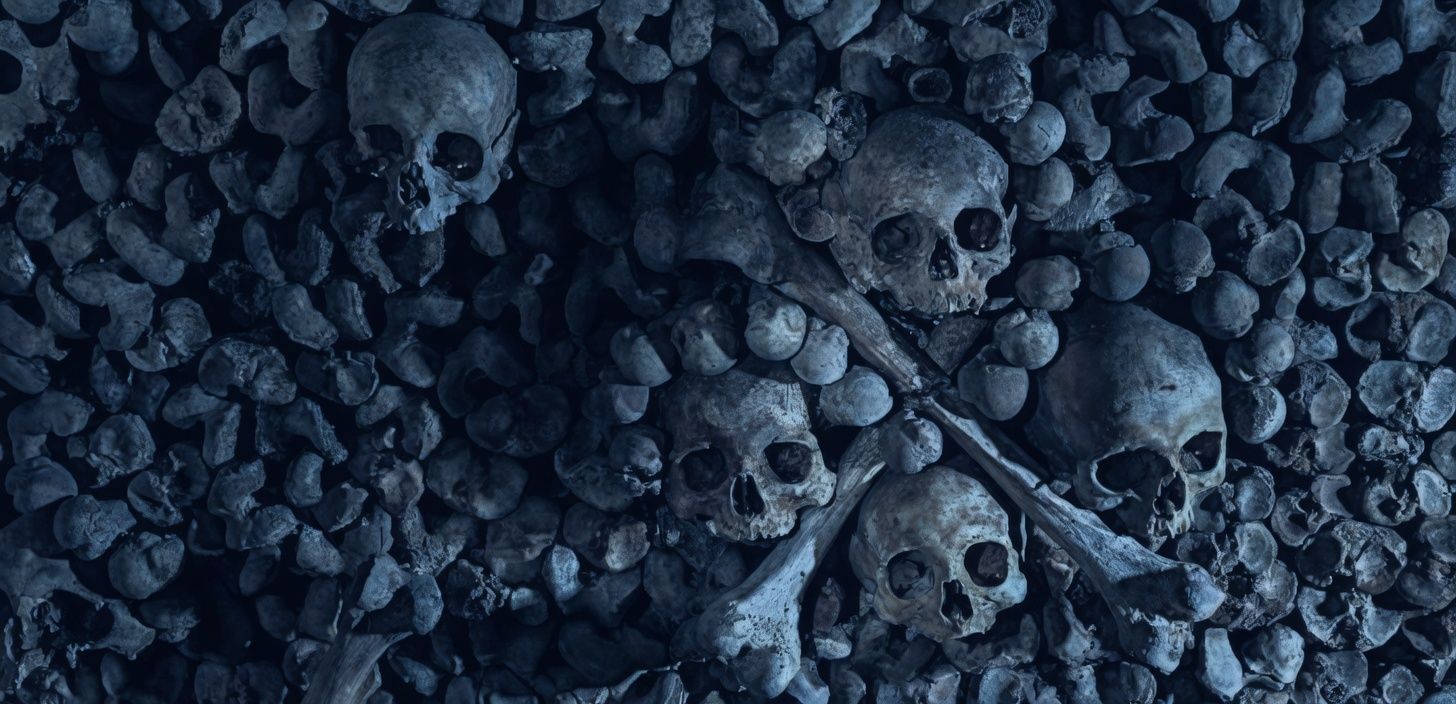 Human skulls and bones in a dark catacomb setting inspired by John Carpenter's Cathedral