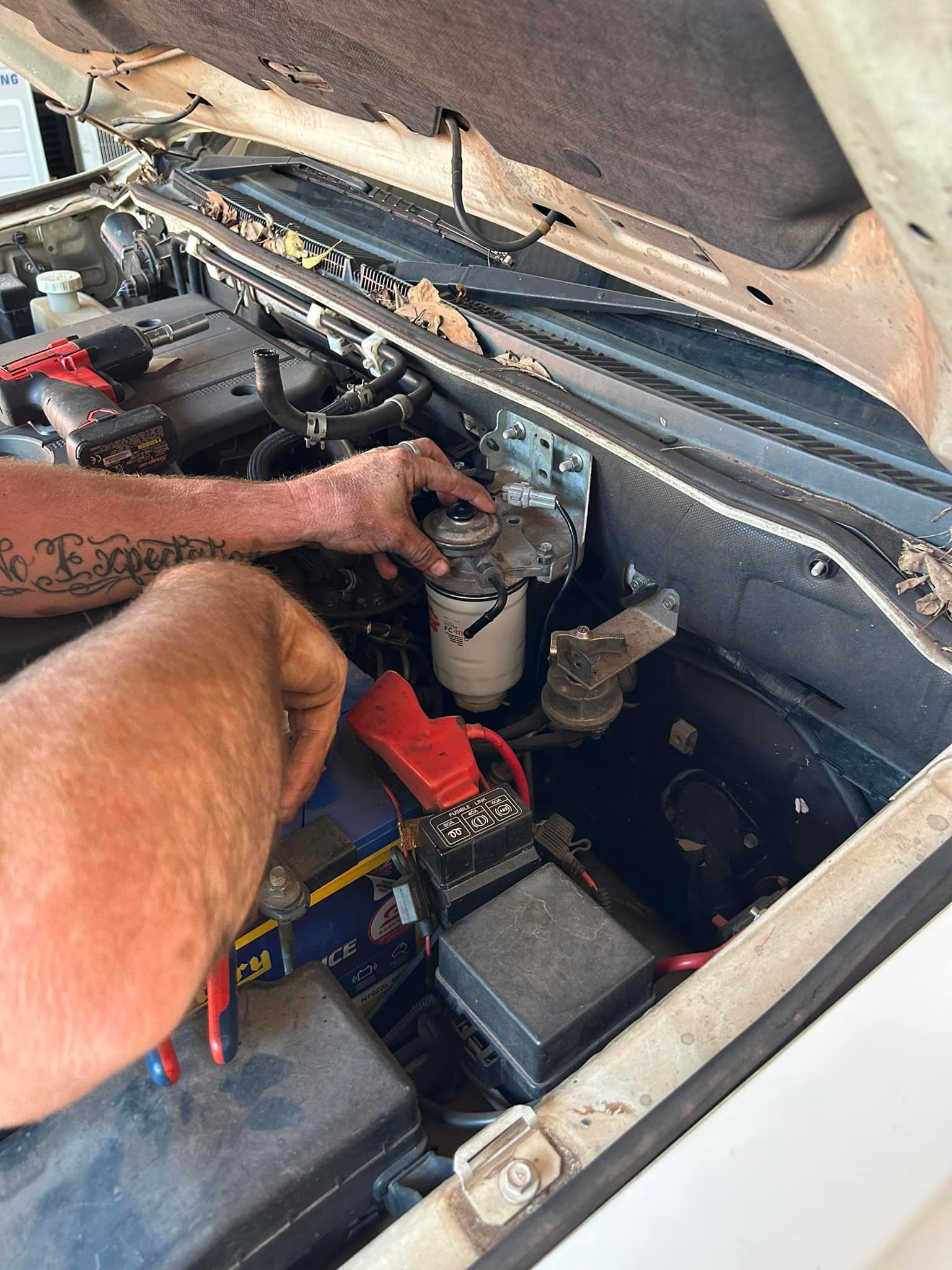 A Mechanic Servicing a Four Wheel Drive— Mudpig Mechanical In Humpty Doo, NT