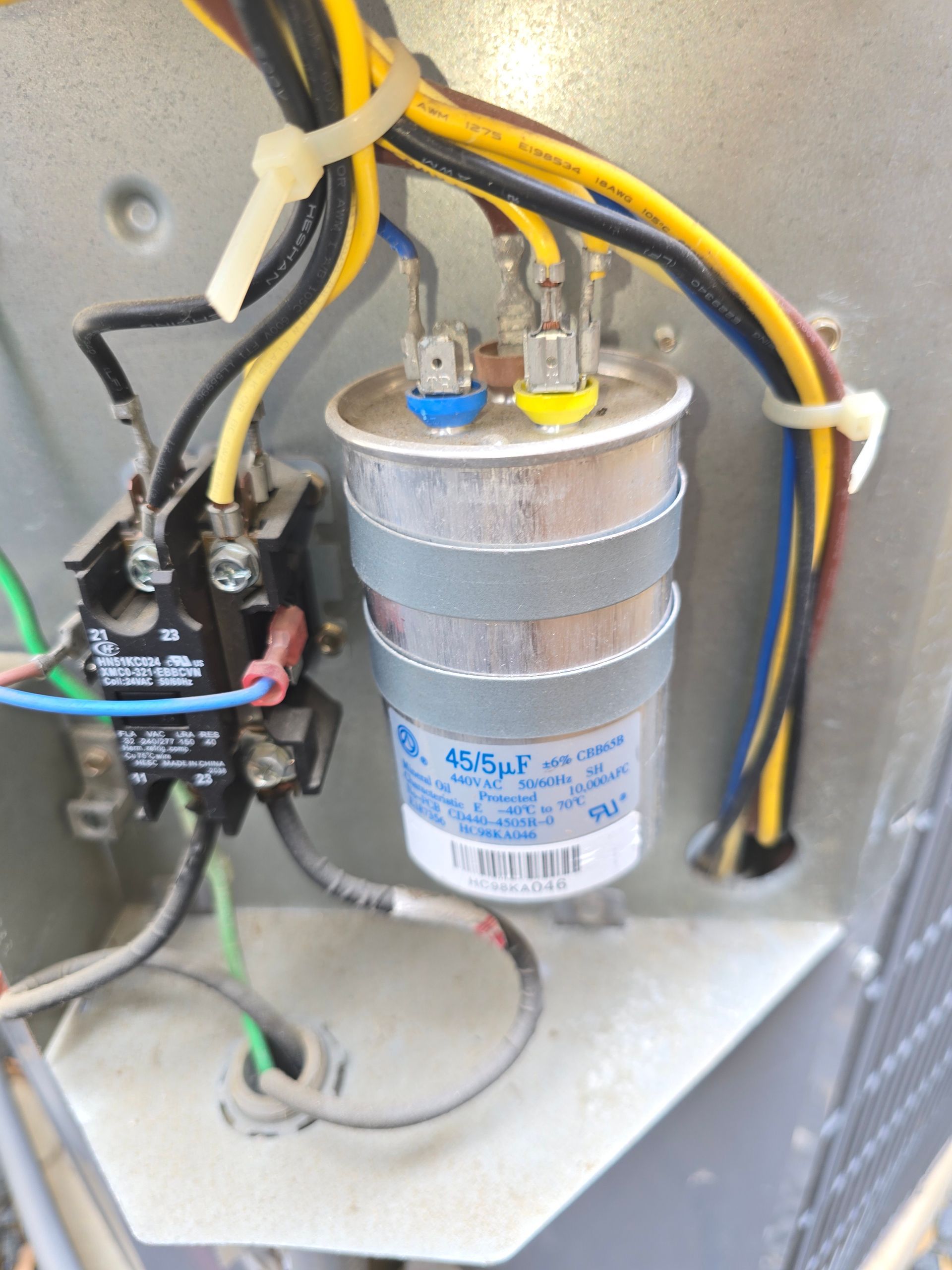 HVAC capacitor testing and replacement by Arnett Mechanical technician in Rosharon TX
