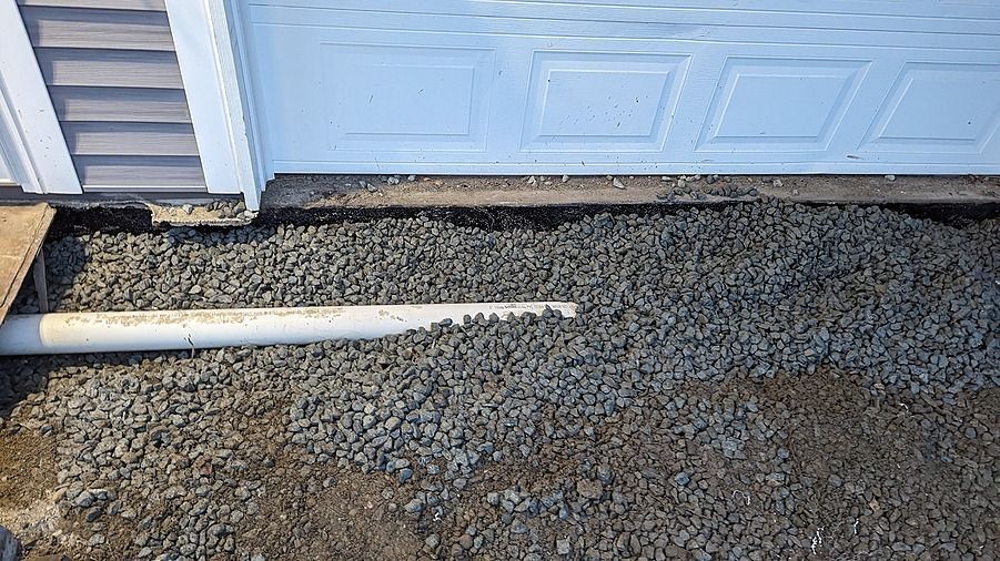 Channel drain installation for driveway