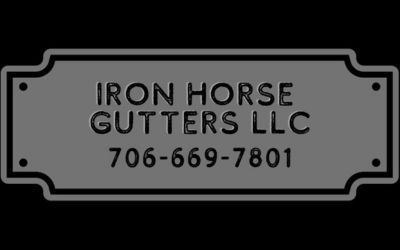 A sign that says iron horse gutters llc on it.