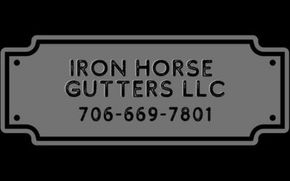 A sign that says iron horse gutters llc on it.